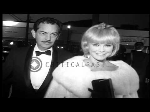 Celebrities arrive at the premier of the movie The Chalk Garden by Ross Hunter. HD Stock Footage